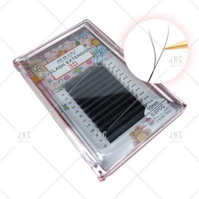 Caixa de extensões de pestanas pretas variadas em embalagem transparente com rótulo colorido floral