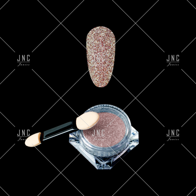 Pó de brilho bronze com aplicador em fundo preto