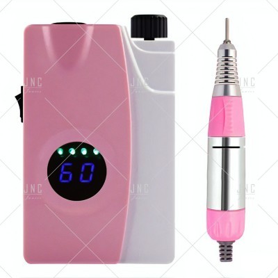 Dispositivo eletrônico rosa com ecrã digital e ferramenta manual rosa