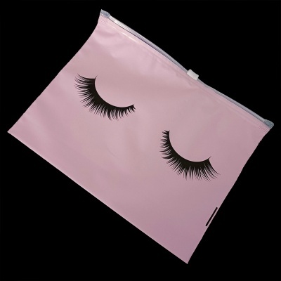 Bolsa rosa com olhos fechados e pestanas pretas