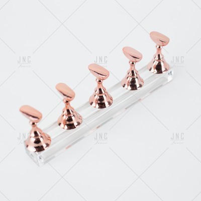 Suporte transparente com cinco ganchos metálicos cor cobre