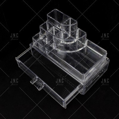 Organizador transparente de acrílico com vários compartimentos e gaveta, fundo preto