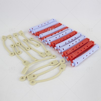 Molas para cabelo em plástico branco e vermelho com elásticos bege