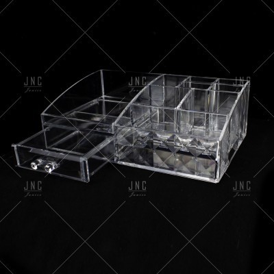Organizador de maquilhagem transparente em acrílico com gaveta.
