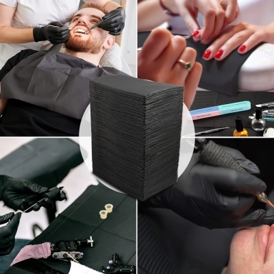 Toalhetes pretos descartáveis para uso em estética, tatuagem e manicure