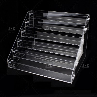 Estante de exposição transparente com cinco prateleiras