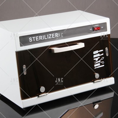 Esterilizador branco com porta de vidro escuro e ícones de utensílios de manicure