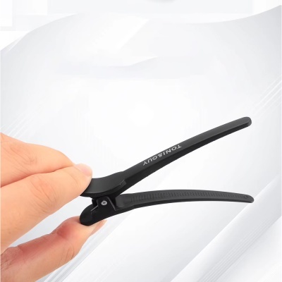 Clipe preto para cabelo com texto TONIGUY