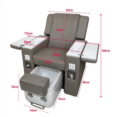 Poltrona de massagem cinza com apoios laterais brancos, recipiente para pedicure e medições em vermelho