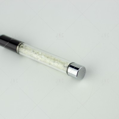 Frasco cilíndrico transparente com cristais ou glitter branco e tampa metálica prateada