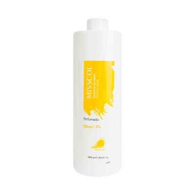 frasco branco com rótulo amarelo do produto MISS COL para cabelo