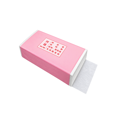 Pacote rosa de lenços de papel branco com texto vermelho em chinês