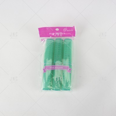 Conjunto de três caracóis de cabelo verdes em embalagem de plástico