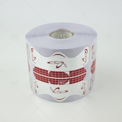 Rolo de moldes de papel para unhas com desenhos vermelhos e texto JNC