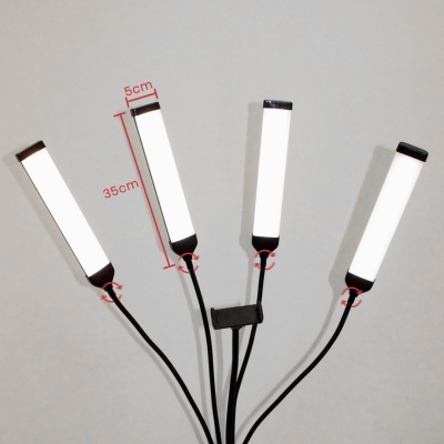 Conjunto de quatro luzes LED retangulares em fundo cinzento