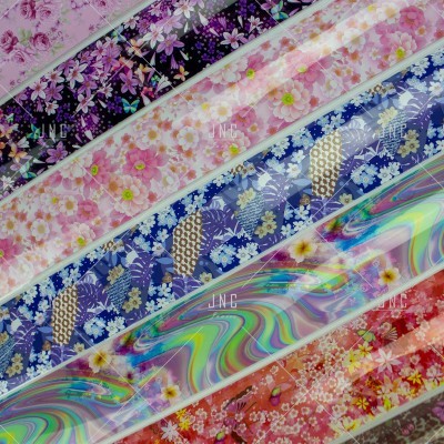 Faixas decorativas florais coloridas com várias texturas e a palavra 'JINC' impressa.