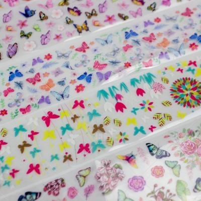 Folhas transparentes com borboletas e flores coloridas dispostas em linhas