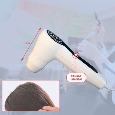 Dispositivo elétrico branco e preto para tratamento capilar de 9 cm com botão pausar imagem
