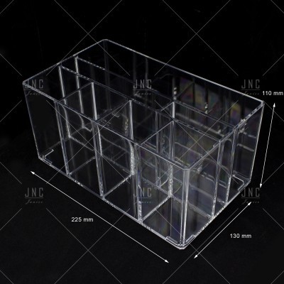 Organizador de acrílico transparente com divisórias em fundo preto