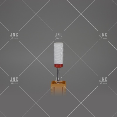 Broca de unha branca com base vermelha num suporte amarelo