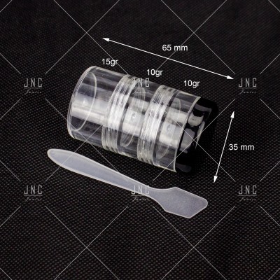 Embalagem plástica transparente com três frascos empilhados e espátula