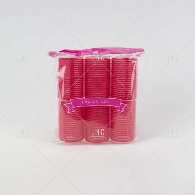 conjunto de caracóis de cabelo vermelhos em embalagem plástica transparente