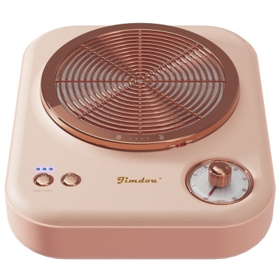Fogão elétrico portátil cor de rosa com grelha metálica e botões dourados