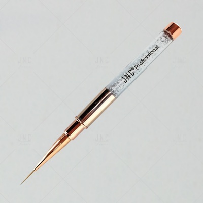 Caneta para unhas transparente com brilhos e detalhes dourados