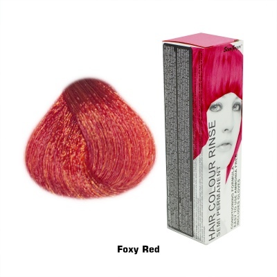 Coloração capilar em creme 'Foxy Red' com amostra de cabelo vermelho vibrante