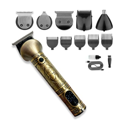 Máquina de cortar cabelo dourada com acessórios