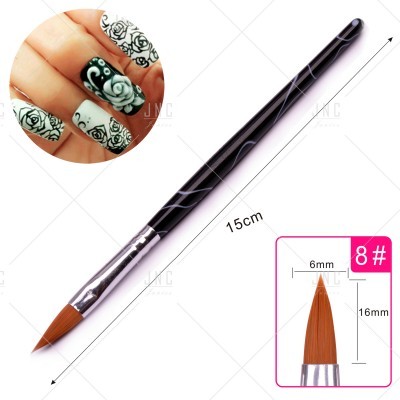 Pincel de unhas preto com ponta fina e unhas decoradas em preto e branco