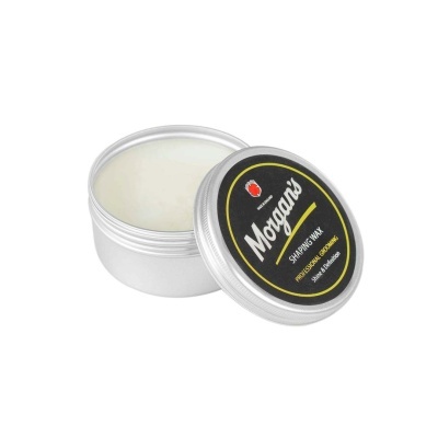 Pote prateado aberto com cera branca da Morgan's com tampa ao lado