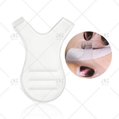 Aplicador transparente para pestanas postiços em plástico com aplicação