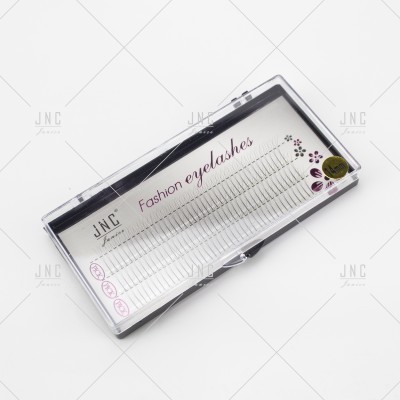 Estojo transparente de pestanas postiças JNC Fashion com texto impresso e selo dourado