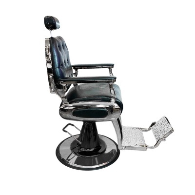cadeira de barbeiro preta com base metálica redonda e descanso para os pés