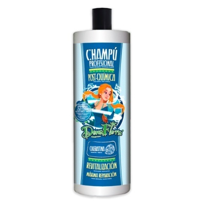 Frasco de champô profissional azul e branco com tampa preta e texto em espanhol