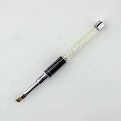 Pincel de maquilhagem com cabo transparente e pedras prateadas