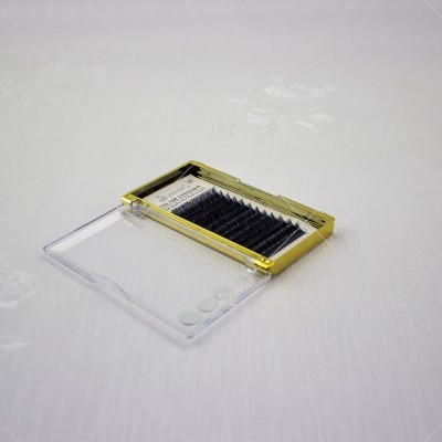 Estojo de extensões de pestanas pretas com tampa transparente e bordas douradas