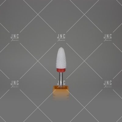 Broca cerâmica branca com base vermelha e haste metálica sobre base amarela