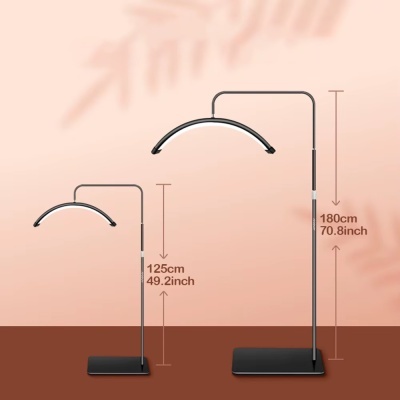 Duas lâmpadas arqueadas com base preta e luz LED, com medidas de altura indicadas