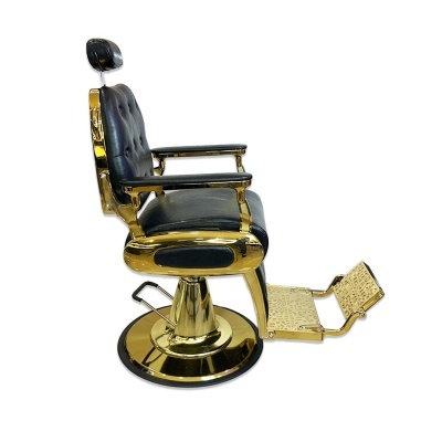 Cadeira de barbeiro preta e dourada com apoio para pés