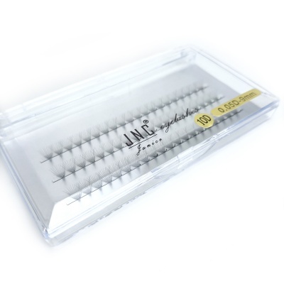 Caixa transparente com pestanas falsas pretas da marca JNC Feminine e texto 100 0.050 9mm