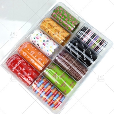 Conjunto de 10 rolos coloridos com padrões de marcas embalados em caixa transparente