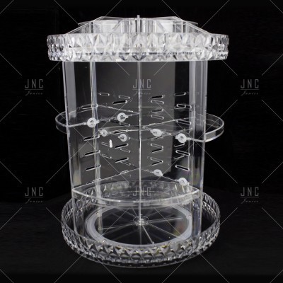 Cilindro transparente em acrílico com ganchos metálicos