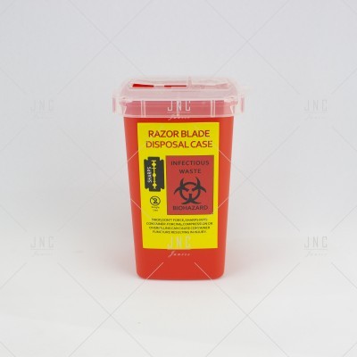 Caixa vermelha para descarte de lâminas com tampa transparente e etiqueta de avisos em inglês