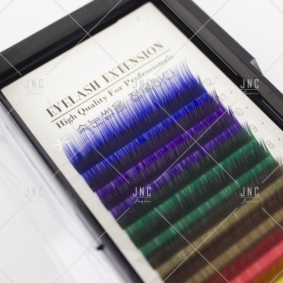 Conjunto colorido de extensões de pestanas SH EXTENSION numa caixa preta com tampa transparente