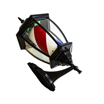 Lanterna decorativa antiga preta com vidro e objeto colorido interior