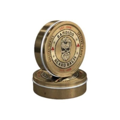 Duas latas douradas de bálsamo para barba Bandido com rótulo redondo e decoração vintage.