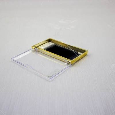 Estojo de cílios postiços com moldura dourada e tampa transparente