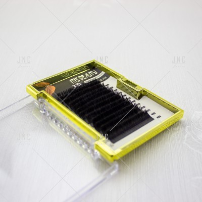 Estojo amarelo e transparente com pestanas pretas para extensão